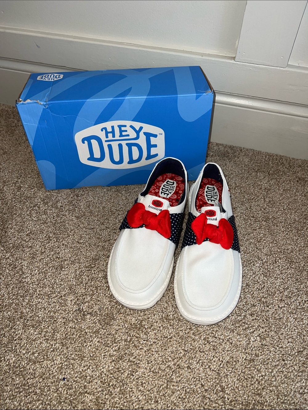 Hey Dude White Slip-Ons with Black Polka-Dot Sides and Red Bows